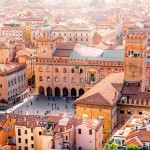 Aerial cityscape view from the tower on Bologna old town center with Maggiore square in Italy