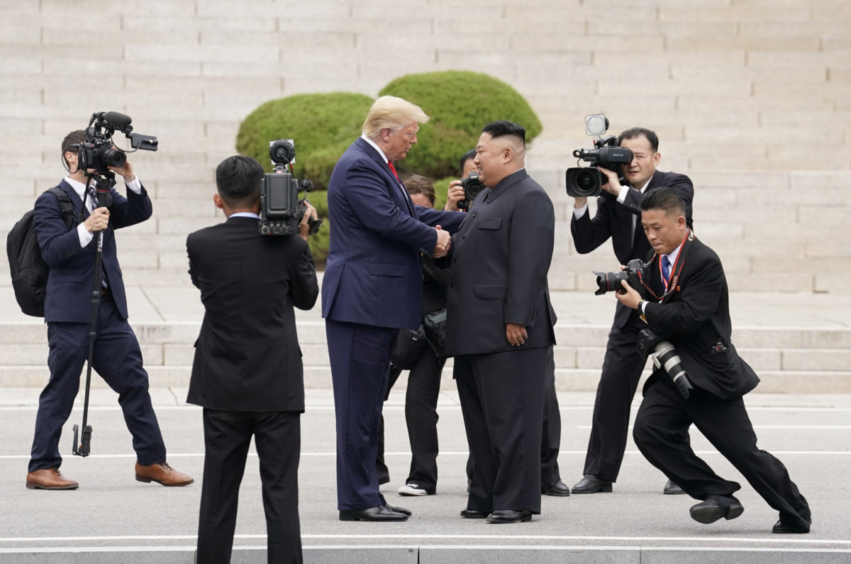 U.S. President Donald Trump meets with North Korean leader Kim Jong Un at the demilitarized zone separating the two Koreas, in Panmunjom, South Korea, June 30, 2019. REUTERS/Kevin Lamarque - RC1D3F626300